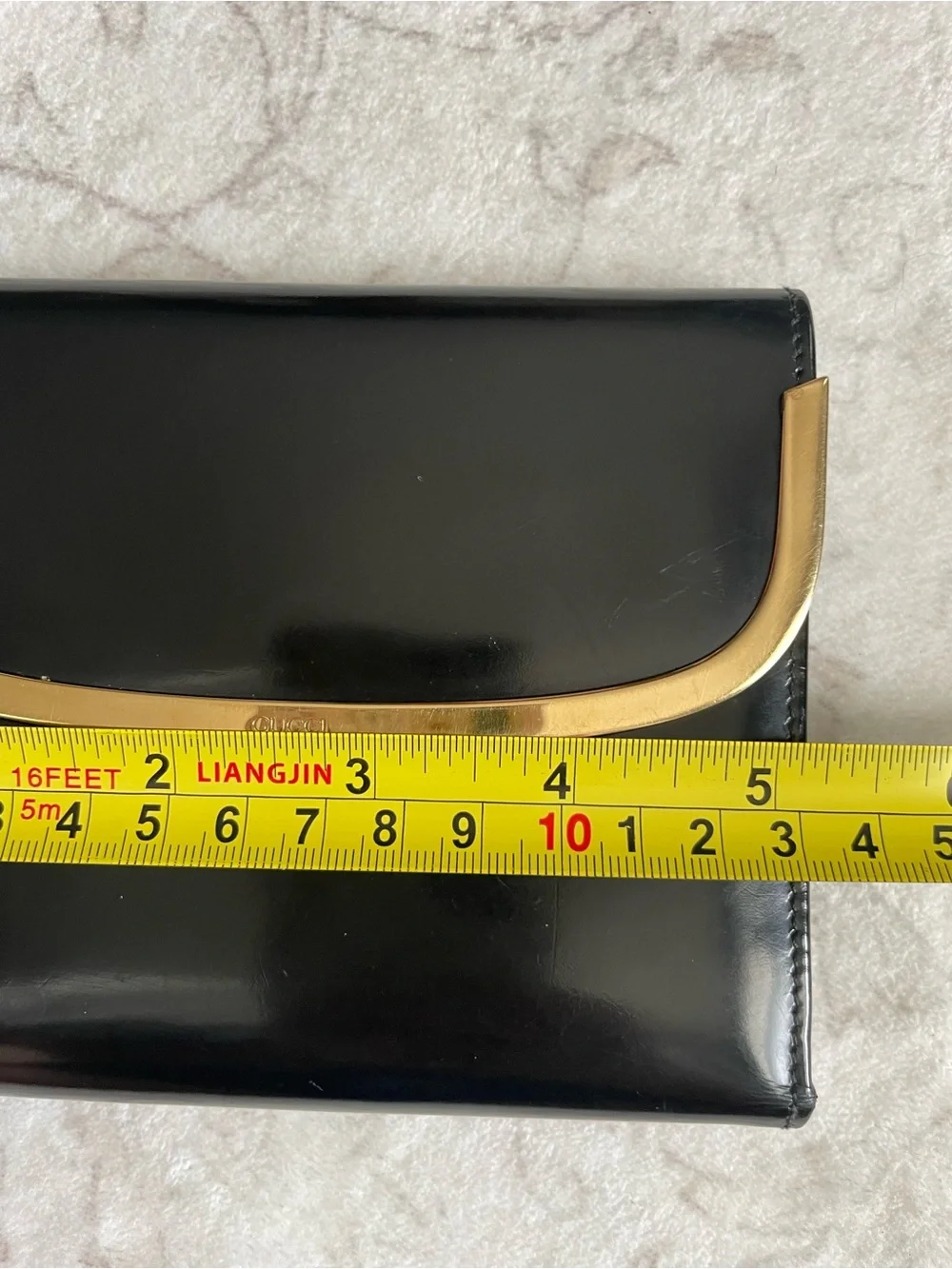 Gucci Black Patent Leather Trifold Wallet with Gold Bar Detail